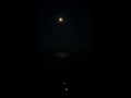 Toronto, moon in lake