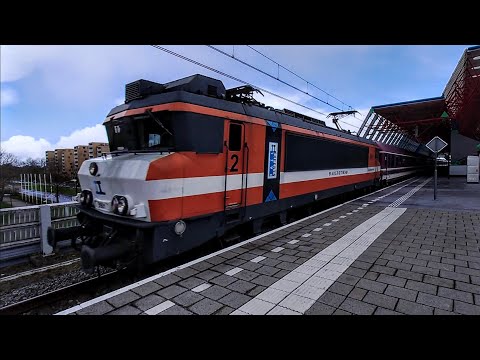 The Frühlings-Express plows full speed through a windy Lelystad Centrum - Fly-by -