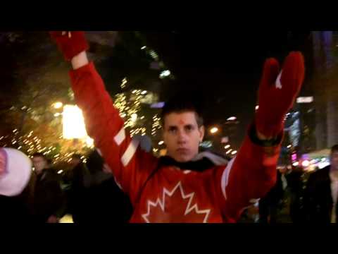 Team Canada fan imitates a statue during the 2010 Winter Olympic Games in Vancouver