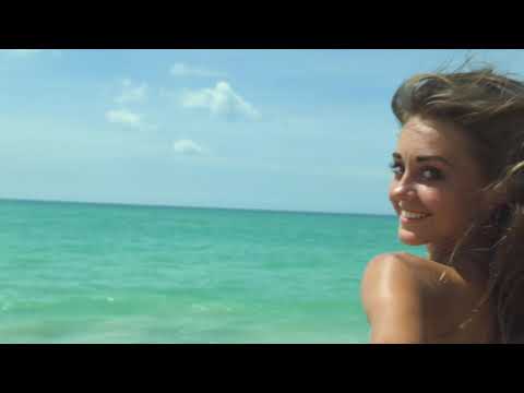 Beautiful woman running on the beach in slow motion - no Copyright 9