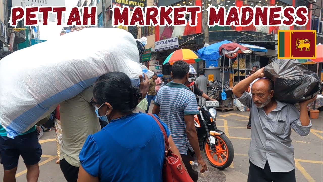 A duo embarks on a visit to Pettah Floating Market.