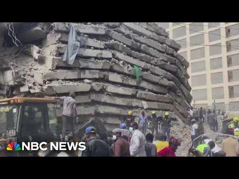 Search for survivors after high-rise collapse