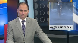 Minot water main break turns intersection into icy river in subzero temperatures