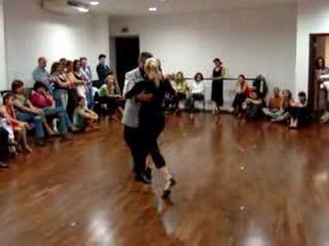  Roberto Herrera  and  Tamara Bisceglia  are  dancing  to  the  tango  "  Asi Se Baila El Tango  "
