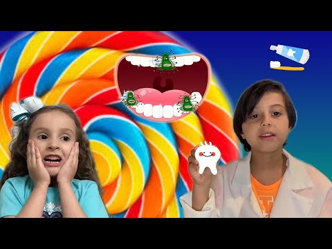 César finge ser dentista por um dia e ensina Luly a escovar os dentes. Teaching to brush teeth