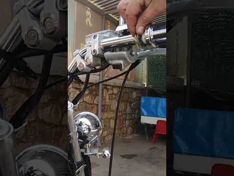 Replacing motorcycle's throttle cables.