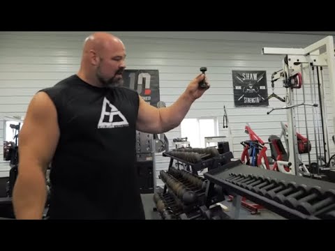 Brian Shaw shows his 1 pound dumbbell