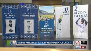 Royals announcer auctions memorabilia for charity