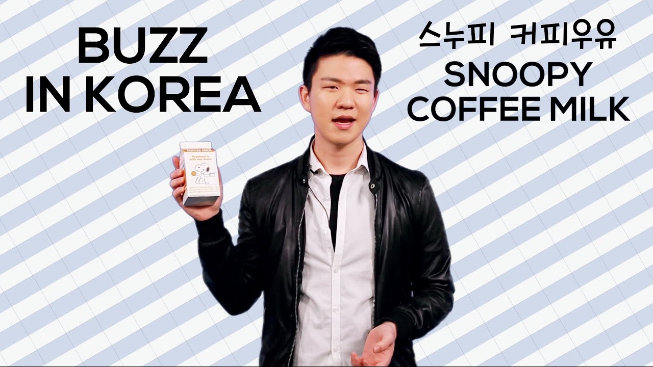 A Korean Maeil Snoopy coffee milk carton featuring the Snoopy character cartoon design on the brown cardboard packaging