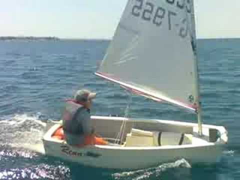 Fast sailing Optimist Denis Alimos