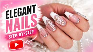 Elegant french nails with flower nail art. Deep smile line and slim looking nails tutorial. 