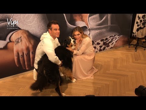 IMPRESSIONEN Robbie Williams mit Ehefrau Ayda und Hund Showbiz in München