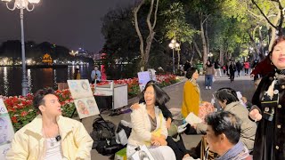 Phát hiện trai Hàn Quốc giống Sơn Tùng vẽ tranh chân dung tại Hồ Gươm Hà Nội ? Và cái kết …