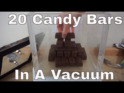 What Happens When You Put 20 Candy Bars In a Huge Vacuum Chamber? Video