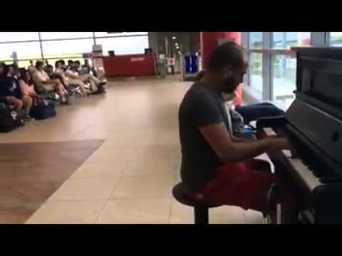 Strange Guy in Airport Unbelievable Piano Talent !!!!