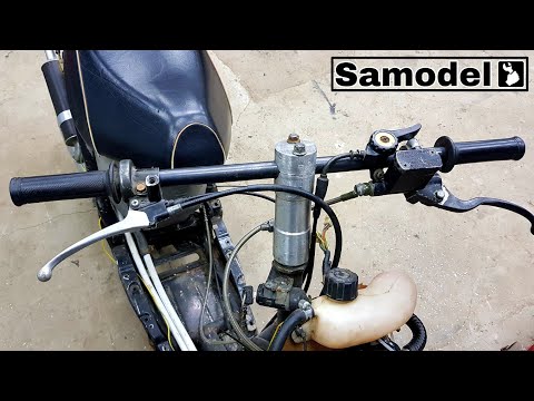 Take out the steering wheel on a Honda Dio scooter