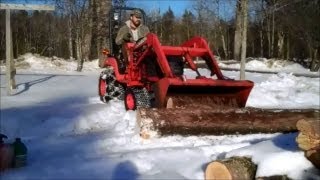 preview picture of video 'Backyard Winter Logging/Skidding with Kubota BX2200 Sub Compact Tractor'