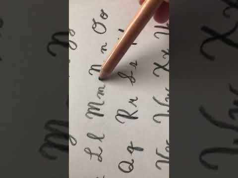 Part of a video titled How to Write Your Name in Cursive - YouTube