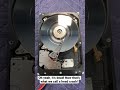 Ever wanted to see inside a HDD with a crashed head? Here you go!