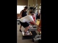Stroke survivor does squats w/ no hands on the ...