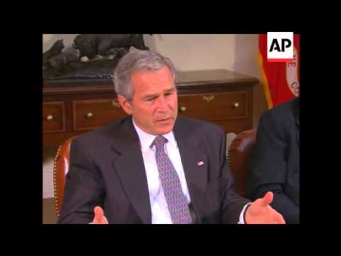 President Bush responds to the bombings in Iraq on Thursday.