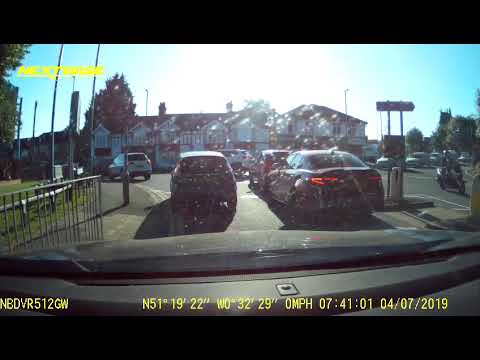 Impatient Driver Tries To Overtake On Mini Roundabout