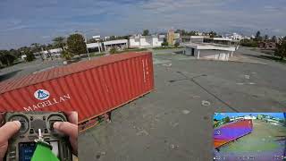 Freestyle FPV drone flight in abandoned fair grounds