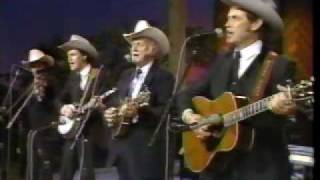 "Christmas Time's A'Coming" by Bill Monroe