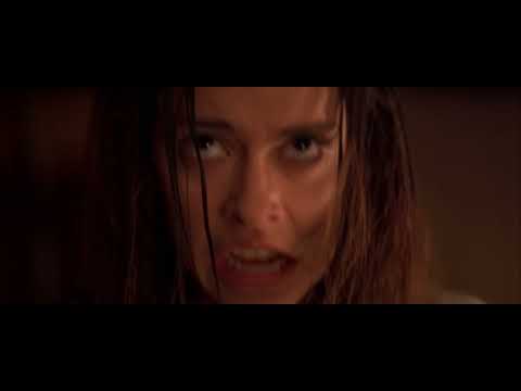 1998 trailer frame: Julie James stares into club lights as the fisherman’s silhouette looms