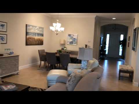 3 bedroom + Den 3 bath pool home in the Golf Community Country Club in River Hall