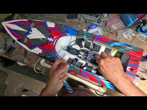 Traxxas Spartan maintenance after first run - address water leak, grease driveshaft, adjust strut
