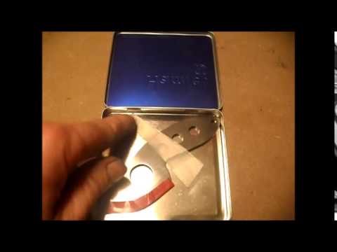 ZPs  THE TOBACCO TIN KNIVES