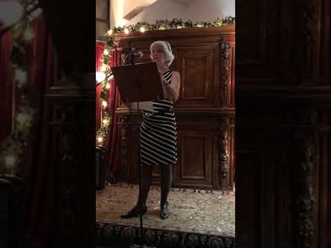 Annette Taylor and Rudy Melena introduce Joy Sawyer at Lighthouse Writers Beacon Award, Dec 2019