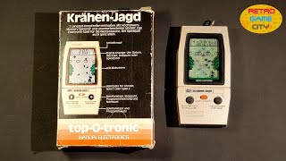 LCD handheld from BANDAI named KRÄHENJAGD in German language