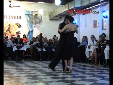  Juan Carlos Katsuren  and  Saeko Miyazaki  are  dancing  to  the  tango  "  Cachirulo  "