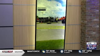 Dump truck tipped over in Appleton crash, one person killed