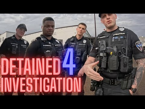 Officers Detain Men With Cameras For Investigation