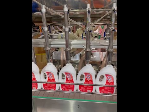 Máy chiết rót nước giặt tự động HV-NGTD12 và HV-TNGTD18 Hoa Việt lắp đặt dây chuyền chiết rót và xoáy nắp chai tự động tại Thanh Hoá