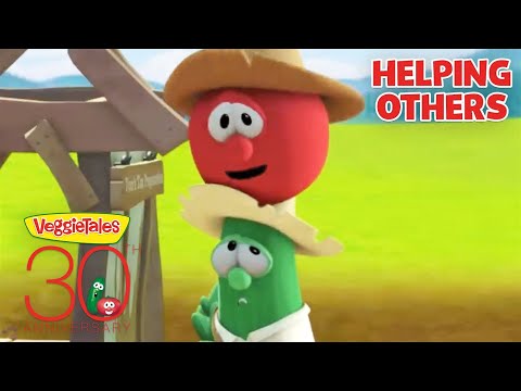Bob the Tomato and Larry the Cucumber lean on a wooden water well, with a 'Helping Others' banner and VeggieTales 30th Anniversary logos in view.