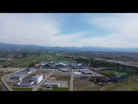 材料デザイン工学科 ドローンにより富山平野から立山、能登半島を望む