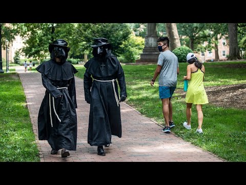 Students dressed as 'plague doctors' try to encourage mask-wearing at UNC