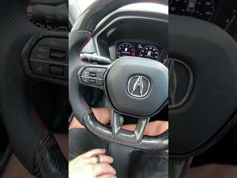 One of the first 2023 Acura Integra carbon fiber steering wheel.