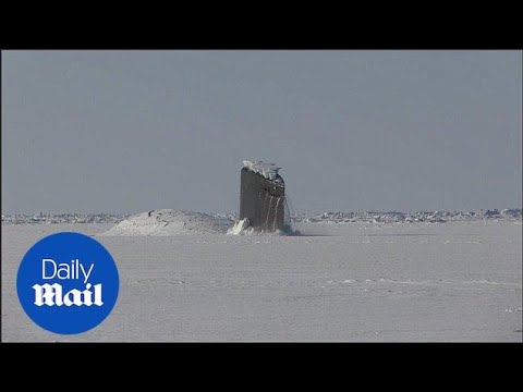 Awesome moment of US Navy sub surfacing through Arctic ice - Daily Mail
