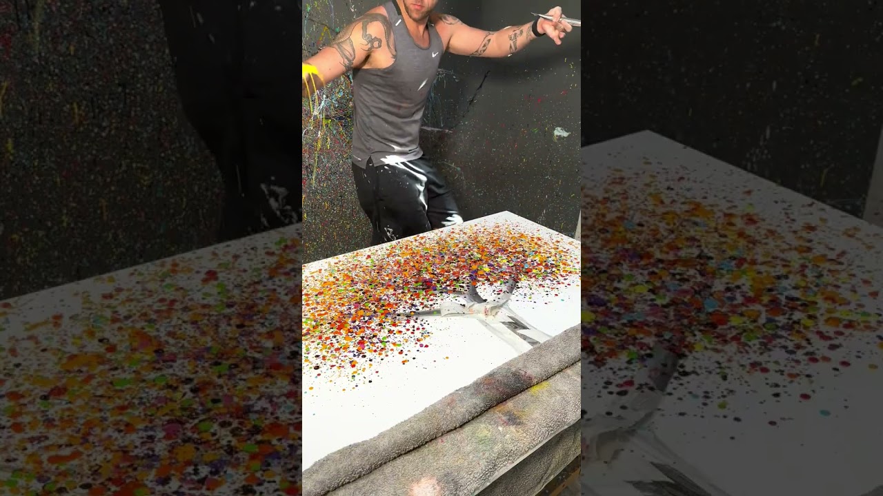 Ashvin Harrison Artist Painting A Large Rainbow Tree