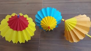 How to make a paper umbrella that open and closes- Step by step process.