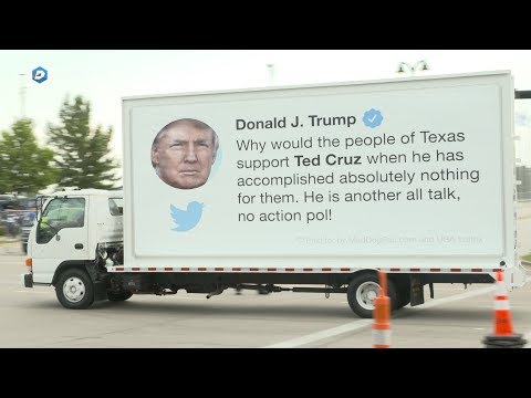 Mobile billboard of Trump criticizing Cruz seen at AT&amp;T Stadium