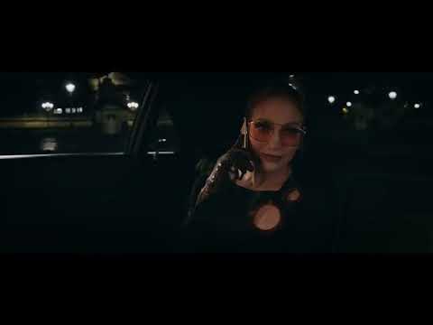 Marry Me trailer frame of Jennifer Lopez performing at a school dance from the film