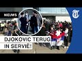 Honderden fans onthalen Djokovic op vliegveld
