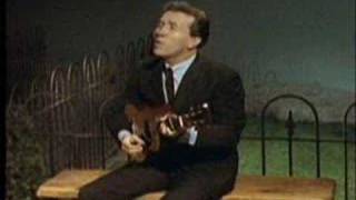 Marty Robbins Sings 'Only A Picture Stops Time.'