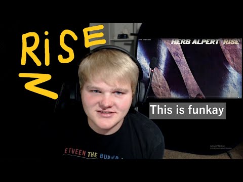 rock fan listens to Herb Alpert - Rise